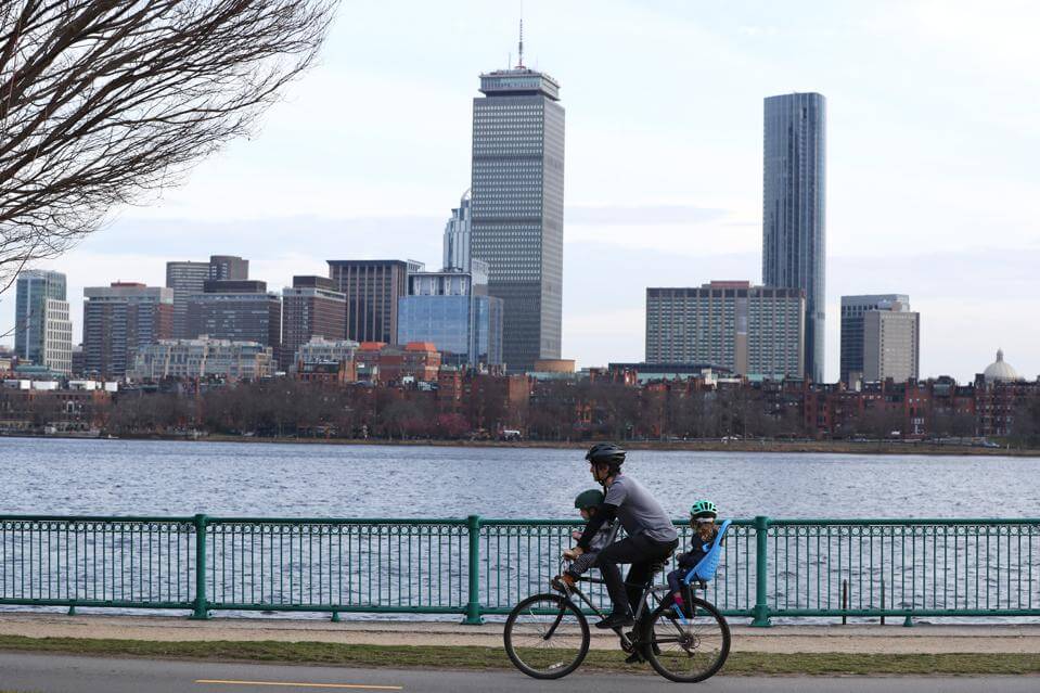 CAMBRIDGE MASSACHUSETTS MARCH 20 A man bikes on the Dr. Paul Dudley White Bike Path on March